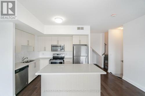 203 - 5279 Highway 7, Vaughan, ON - Indoor Photo Showing Kitchen With Double Sink With Upgraded Kitchen