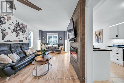 250 Fall Fair Way, Hamilton, ON - Indoor Photo Showing Living Room With Fireplace