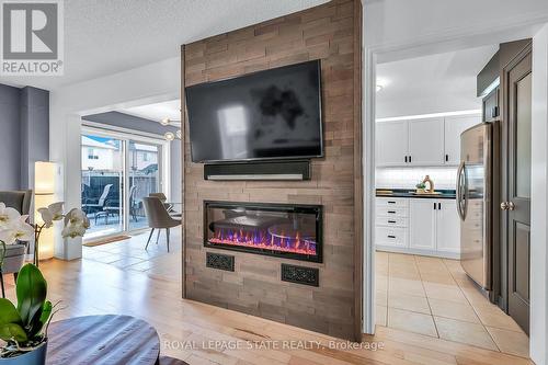 250 Fall Fair Way, Hamilton, ON - Indoor Photo Showing Living Room With Fireplace