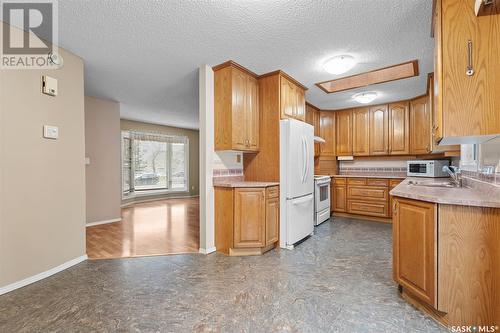 327 Kellough Road, Saskatoon, SK - Indoor Photo Showing Kitchen With Double Sink