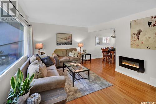 12 Mcaskill Crescent, Saskatoon, SK - Indoor Photo Showing Living Room With Fireplace