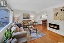 12 Mcaskill Crescent, Saskatoon, SK  - Indoor Photo Showing Living Room With Fireplace 