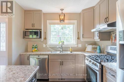 140 - 301 Carnegie Avenue, Peterborough (Northcrest), ON - Indoor Photo Showing Kitchen With Stainless Steel Kitchen With Double Sink With Upgraded Kitchen