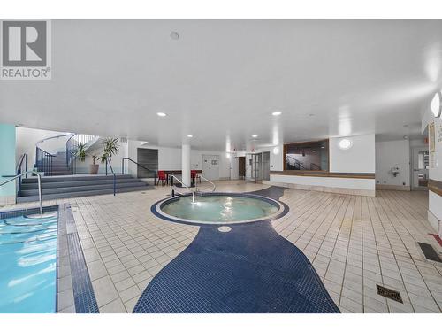 Th K 1111 Marinaside Crescent, Vancouver, BC - Indoor Photo Showing Other Room With In Ground Pool