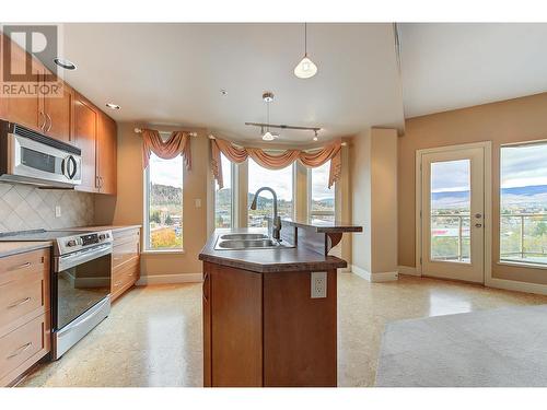 1947 Underhill Street Unit# 901, Kelowna, BC - Indoor Photo Showing Kitchen With Double Sink