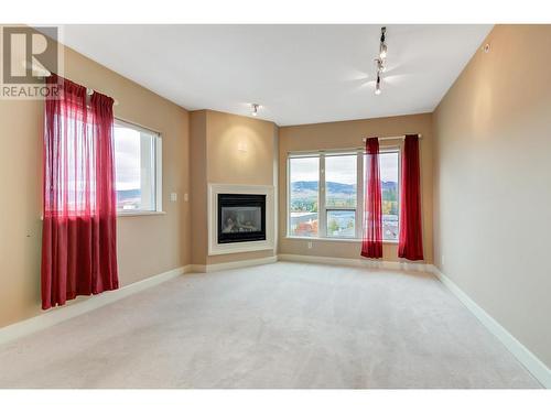 1947 Underhill Street Unit# 901, Kelowna, BC - Indoor With Fireplace