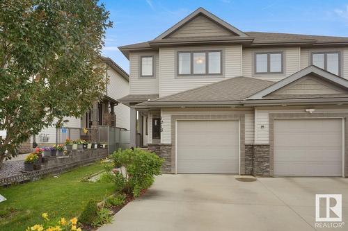 #Upper 1218 30 Av Nw, Edmonton, AB - Outdoor With Facade