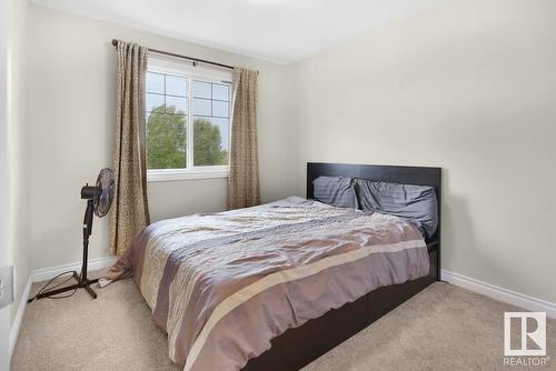 #Upper 1218 30 Av Nw, Edmonton, AB - Indoor Photo Showing Bedroom