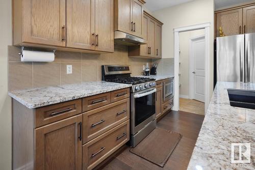 #Upper 1218 30 Av Nw, Edmonton, AB - Indoor Photo Showing Kitchen With Upgraded Kitchen