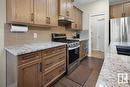 #Upper 1218 30 Av Nw, Edmonton, AB  - Indoor Photo Showing Kitchen With Upgraded Kitchen 