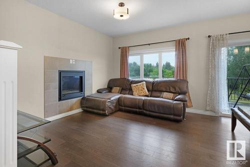 #Upper 1218 30 Av Nw, Edmonton, AB - Indoor Photo Showing Living Room With Fireplace