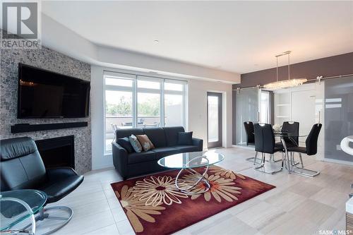 302 922 Broadway Avenue, Saskatoon, SK - Indoor Photo Showing Living Room With Fireplace