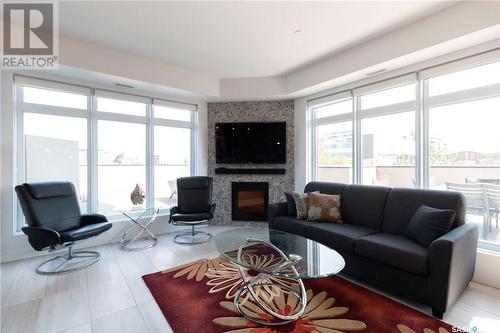 302 922 Broadway Avenue, Saskatoon, SK - Indoor Photo Showing Living Room With Fireplace