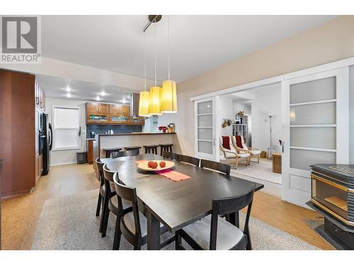 16117 3A Highway, Crawford Bay, BC - Indoor Photo Showing Dining Room With Fireplace