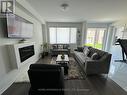 41 Spinland Street, Caledon, ON  - Indoor Photo Showing Living Room With Fireplace 