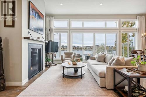 468 Auburn Shores Landing Se, Calgary, AB - Indoor Photo Showing Living Room With Fireplace