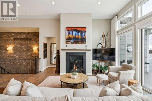 468 Auburn Shores Landing Se, Calgary, AB - Indoor Photo Showing Living Room With Fireplace