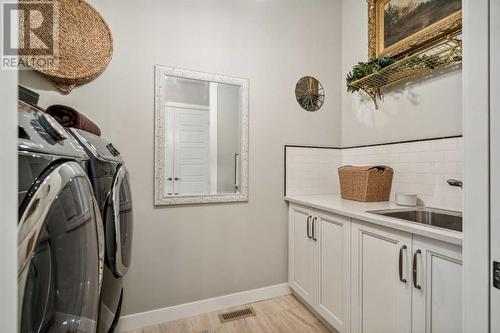 468 Auburn Shores Landing Se, Calgary, AB - Indoor Photo Showing Laundry Room