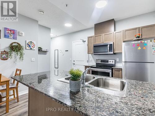 309 - 1370 Costigan Road, Milton, ON - Indoor Photo Showing Kitchen With Double Sink