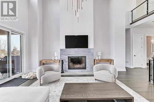 107 Sladden Court, Blue Mountains, ON - Indoor Photo Showing Living Room With Fireplace