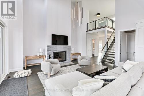 107 Sladden Court, Blue Mountains, ON - Indoor Photo Showing Living Room With Fireplace