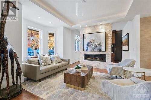 89 Fourth Avenue, Ottawa, ON - Indoor Photo Showing Living Room With Fireplace