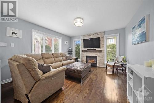 306 Riversedge Crescent, Ottawa, ON - Indoor Photo Showing Living Room With Fireplace