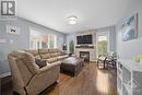 306 Riversedge Crescent, Ottawa, ON  - Indoor Photo Showing Living Room With Fireplace 