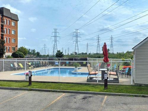 Piscine - 214-325 Rue Éricka, Laval (Fabreville), QC - Outdoor With In Ground Pool