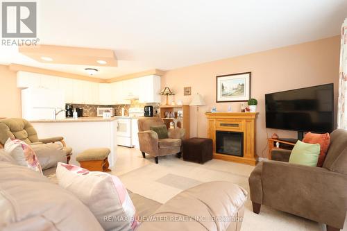 266 Pebble Beach Parkway, South Huron (Stephen Twp), ON - Indoor Photo Showing Living Room With Fireplace