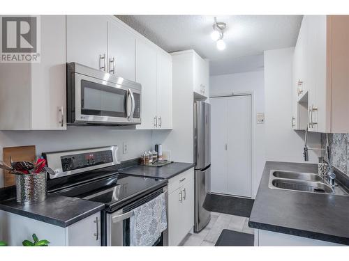 198 Roy Avenue Unit# 207, Penticton, BC - Indoor Photo Showing Kitchen With Double Sink With Upgraded Kitchen