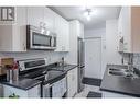 198 Roy Avenue Unit# 207, Penticton, BC  - Indoor Photo Showing Kitchen With Double Sink With Upgraded Kitchen 