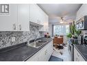 198 Roy Avenue Unit# 207, Penticton, BC  - Indoor Photo Showing Kitchen With Double Sink 