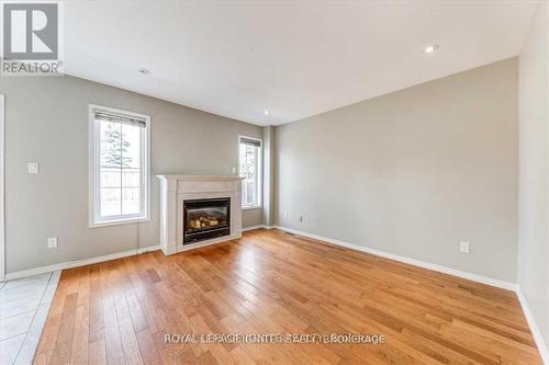 32 Tansley Crescent, Ajax, ON - Indoor Photo Showing Living Room With Fireplace