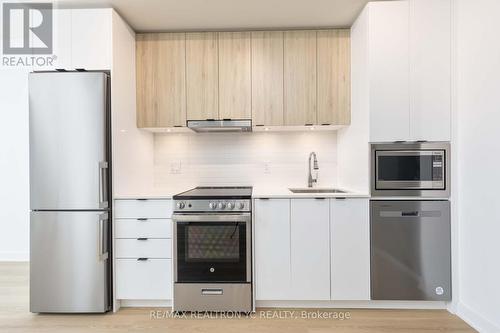 A205 - 30 Upper Mall Way, Vaughan, ON - Indoor Photo Showing Kitchen