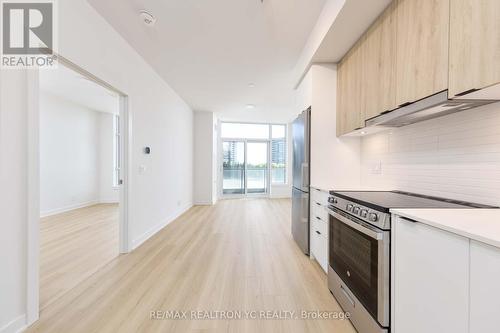 A205 - 30 Upper Mall Way, Vaughan, ON - Indoor Photo Showing Kitchen