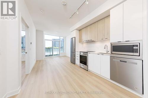 A205 - 30 Upper Mall Way, Vaughan, ON - Indoor Photo Showing Kitchen