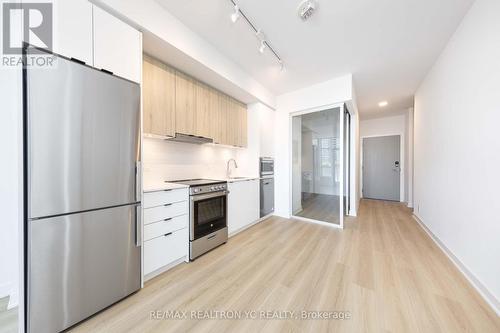 A205 - 30 Upper Mall Way, Vaughan, ON - Indoor Photo Showing Kitchen