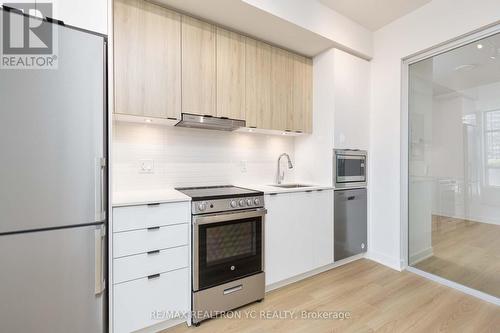 A205 - 30 Upper Mall Way, Vaughan, ON - Indoor Photo Showing Kitchen