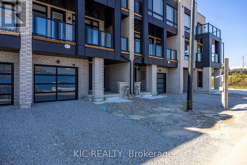 62 Dandara Gate, Vaughan, ON - Outdoor With Balcony With Facade