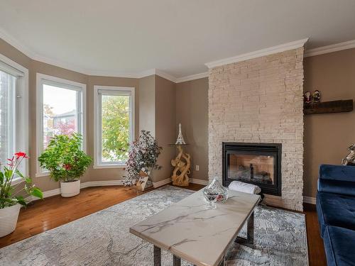 Salon - 69 Grand Boulevard O., Saint-Bruno-De-Montarville, QC - Indoor Photo Showing Living Room With Fireplace