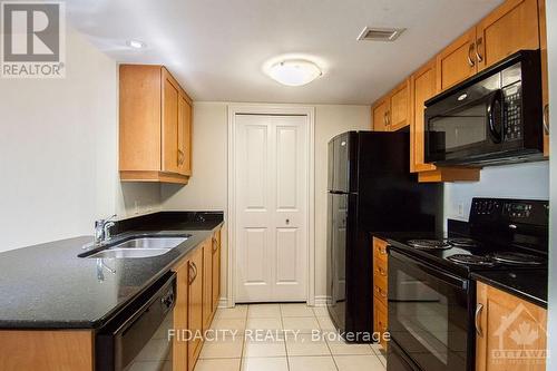 702 - 314 Central Park Drive, Ottawa, ON - Indoor Photo Showing Kitchen With Double Sink