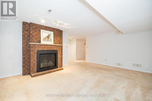 9 Briarwood Drive, New Tecumseth, ON - Indoor Photo Showing Living Room With Fireplace