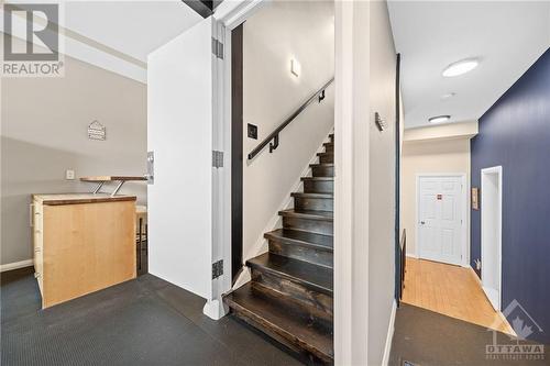 Stairs from Upper Unit A to Lower Unit B - 469 Booth Street, Ottawa, ON - Indoor Photo Showing Other Room