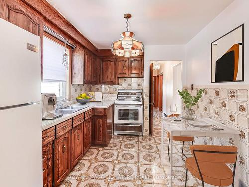 24 Castille Ave, Toronto, ON - Indoor Photo Showing Kitchen With Double Sink