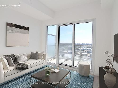 1911-2033 Kennedy Rd, Toronto, ON - Indoor Photo Showing Living Room