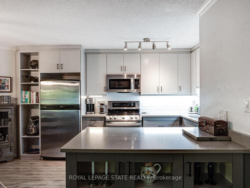 102-1220 Thorpe Rd, Burlington, ON - Indoor Photo Showing Kitchen With Stainless Steel Kitchen