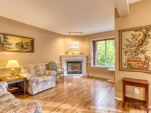 B-2191 Mission Rd, Courtenay, BC - Indoor Photo Showing Living Room With Fireplace