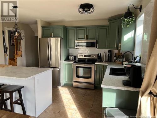 91 Theriault, Dieppe, NB - Indoor Photo Showing Kitchen With Double Sink