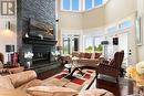 123 Slater Crescent, Edenwold Rm No. 158, SK  - Indoor Photo Showing Living Room With Fireplace 